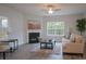 Cozy living room featuring a fireplace, natural light, and comfortable seating at 149 High Rock Ct # 02, Statesville, NC 28677