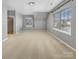Spacious bedroom featuring carpet, two windows, and neutral colors at 15120 Callow Forest Dr, Charlotte, NC 28273