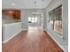 Bright dining room featuring hardwood floors, neutral gray walls, and natural light at 15120 Callow Forest Dr, Charlotte, NC 28273