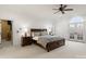 Spacious bedroom with a ceiling fan, and access to a private balcony with french doors at 17429 Staysail Ct, Cornelius, NC 28031
