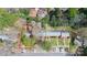 Aerial view of the property, showing the roof and surrounding trees and neighborhood with available parking at 1817 Jameston Dr, Charlotte, NC 28209