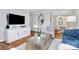 Beautifully designed living room with hardwood floors, comfortable seating, and contemporary decor throughout at 1817 Jameston Dr, Charlotte, NC 28209