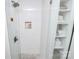 Elegant shower with glass door, white subway tile, and built-in shelving at 1817 Jameston Dr, Charlotte, NC 28209