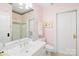 Well-lit bathroom with a large mirror, updated vanity, and a glass shower enclosure at 19118 Betty Stough Rd, Cornelius, NC 28031