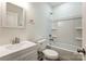 Bright bathroom featuring a tub/shower combo and modern sink at 2313 N Main St, Kannapolis, NC 28081