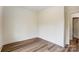 Neutral bedroom with hardwood floors and recessed lighting at 2313 N Main St, Kannapolis, NC 28081