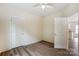 Neutral bedroom with ceiling fan, and hardwood floors at 2313 N Main St, Kannapolis, NC 28081