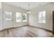 An open dining area featuring a door to the outside and bright natural light at 2313 N Main St, Kannapolis, NC 28081