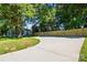 Long driveway with new wooden fence and home in the yard at 2313 N Main St, Kannapolis, NC 28081