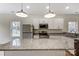 Kitchen island featuring granite countertops, stainless steel appliances, and ample cabinet space at 2313 N Main St, Kannapolis, NC 28081