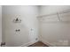 Utility room with modern hookups and wire rack shelf at 2313 N Main St, Kannapolis, NC 28081