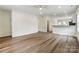 Spacious living room with modern wood floors, offering a versatile area for relaxation and entertainment at 2313 N Main St, Kannapolis, NC 28081