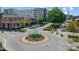 Charming street view of a roundabout with beautifully landscaped areas in a lively commercial and residential area at 2313 N Main St, Kannapolis, NC 28081