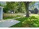 Long driveway with new wooden fence in the big, green yard at 2313 N Main St, Kannapolis, NC 28081