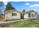 A charming one-story home with black shutters and a welcoming front porch with the American flag at 2413 Hoffman St, Gastonia, NC 28054