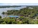 Aerial shot of a charming neighborhood with lake access and lush greenery showcasing waterfront living at 27056 Catamaran Dr, Tega Cay, SC 29708