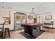 Basement showcasing a pool table and french doors with lake views at 27056 Catamaran Dr, Tega Cay, SC 29708