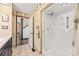 Bathroom featuring shower, vanity, and doorway leading into the rest of the home at 27056 Catamaran Dr, Tega Cay, SC 29708