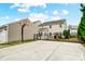 This backyard features a basketball court and porch perfect for outdoor recreation at 3350 Keady Mill Loop, Kannapolis, NC 28081