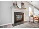 Elegant fireplace with a decorative mantel, complemented by modern decor and soft lighting at 3350 Keady Mill Loop, Kannapolis, NC 28081
