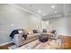 Inviting living room with stylish sofas, patterned rug, and comfortable decor at 3350 Keady Mill Loop, Kannapolis, NC 28081