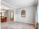 Cozy living room featuring neutral walls, plush carpet, and decorative details at 3350 Keady Mill Loop, Kannapolis, NC 28081