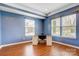 Well-lit office space with laminate floors, modern desk, and neutral decor at 3350 Keady Mill Loop, Kannapolis, NC 28081