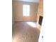 Bright bedroom featuring light wood-look flooring and neutral walls at 336 Hudson St, Shelby, NC 28150