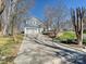 Charming two-story home with a long driveway and meticulously landscaped front yard at 4021 Waterford Dr, Charlotte, NC 28226