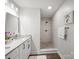 Elegant bathroom boasting double vanity, walk-in shower, and modern fixtures at 407 E Talleyrand St, Monroe, NC 28112