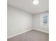 Empty bedroom featuring carpet, natural light, and neutral walls at 407 E Talleyrand St, Monroe, NC 28112