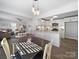 Bright and airy kitchen featuring white cabinets, stainless steel appliances, and an open layout at 407 E Talleyrand St, Monroe, NC 28112