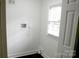 Bright laundry room featuring natural light from a window at 407 E Talleyrand St, Monroe, NC 28112