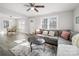 Inviting living room showcases an open layout with a dining area and abundant natural light at 407 E Talleyrand St, Monroe, NC 28112
