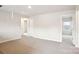 This is a light-filled bedroom with neutral walls and carpeted floors, offering a cozy, blank canvas at 410 Luna Ln, Shelby, NC 28152