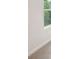 Minimalist bedroom featuring carpet, a window for natural light, and neutral walls, offering a versatile design at 410 Luna Ln, Shelby, NC 28152