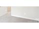 Well-lit hallway with fresh carpet and crisp white trim, leading to comfortable and inviting spaces at 410 Luna Ln, Shelby, NC 28152