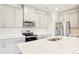Modern kitchen features stainless appliances, stone countertops and subway tile backsplash at 410 Luna Ln, Shelby, NC 28152