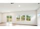 Bright living room with laminate floors, recessed lighting, and sliding glass doors to the outside at 410 Luna Ln, Shelby, NC 28152