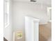 The staircase landing has a window and the floors are carpeted at 410 Luna Ln, Shelby, NC 28152