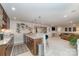 Finished basement with a stylish wet bar, wine storage, and a spacious seating area for entertaining and relaxation at 4660 Ardmore Ln, Harrisburg, NC 28075