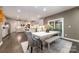 Cozy dining room with modern furnishings, including a stylish table and chairs, set on hardwood floors at 4660 Ardmore Ln, Harrisburg, NC 28075