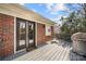 This back deck features a grill and offers an outdoor living space at 4820 Valley Stream Rd, Charlotte, NC 28209