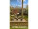 Beautiful backyard with patio, outdoor seating, and fire pit, perfect for entertaining guests and relaxing outdoors at 4820 Valley Stream Rd, Charlotte, NC 28209