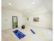 Spacious home gym featuring a mirror, fitness ball, exercise mat and weights at 4830 Broad Hollow Dr, Charlotte, NC 28226