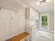 Mudroom featuring coat hooks, a built-in bench, and a sink at 4830 Broad Hollow Dr, Charlotte, NC 28226