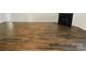 Inviting living room featuring attractive floors and a cozy fireplace, perfect for relaxing evenings at 4906 Lynn Lee Cir, Charlotte, NC 28269