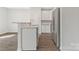 Kitchen features a breakfast bar with stainless steel dishwasher and undermount sink at 511 Roberts St, Shelby, NC 28150