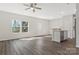 Open-concept living area boasts abundant natural light, breakfast bar and backyard access at 511 Roberts St, Shelby, NC 28150