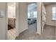View of the bedroom and bathroom featuring plush carpet and vaulted ceilings at 522 Trading Post Ln, York, SC 29745